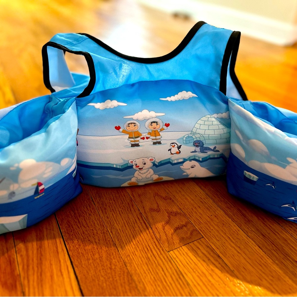 Used once - 2-6 year old swim vest